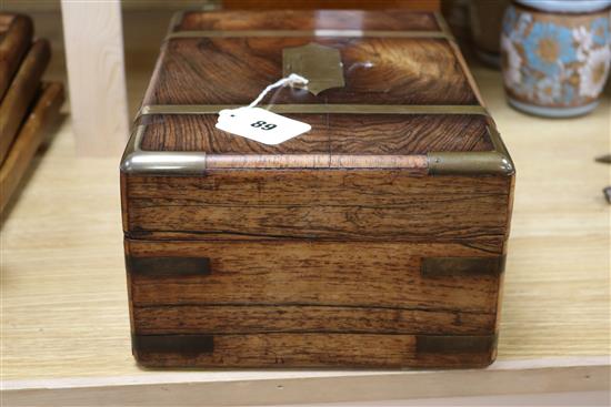 An early Victorian brass mounted rosewood toilet box with fitted plate, mounted interior width 30cm depth 21cm